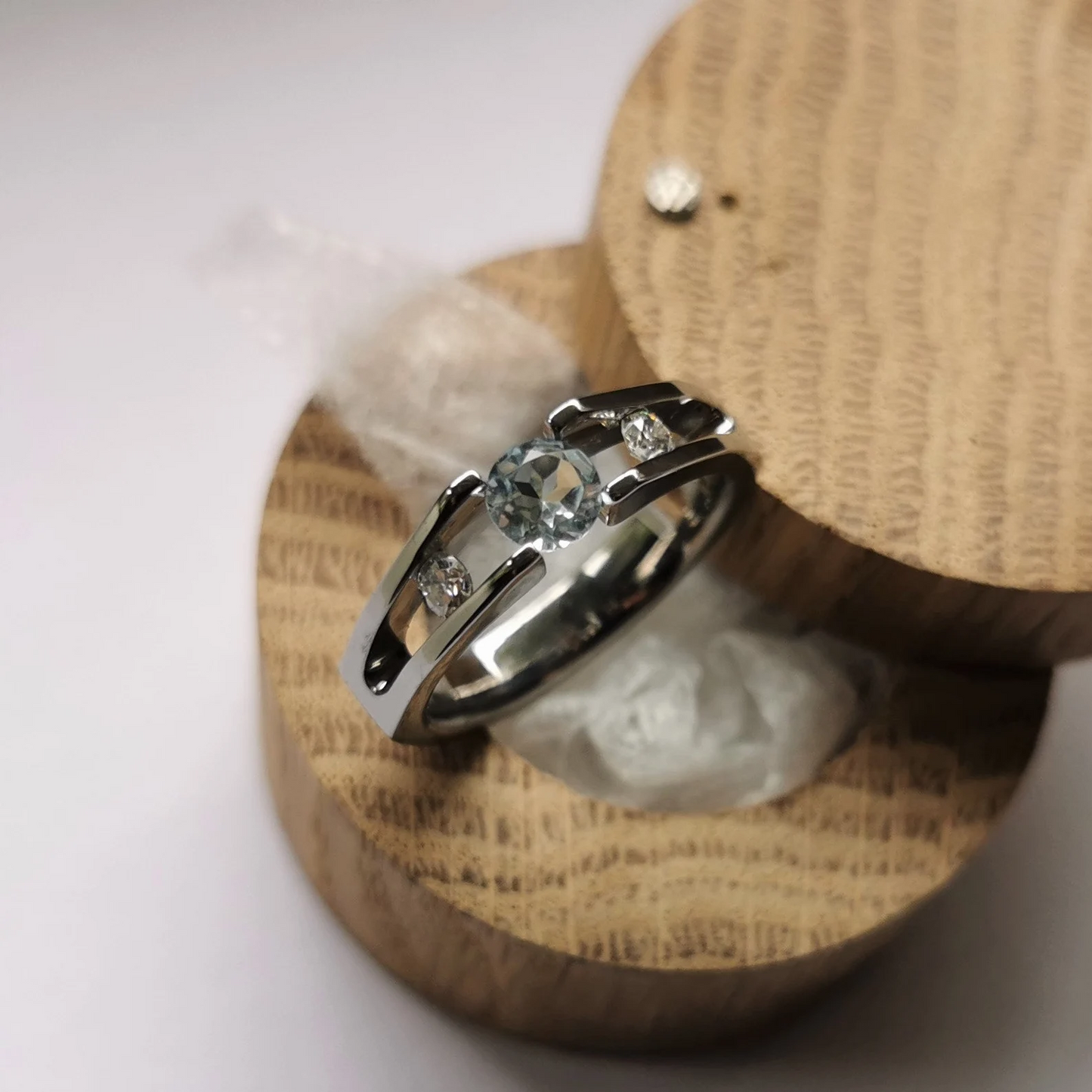 Unique Handmade Polished Titanium Tension Ring with Round Diamond Cut Stone Setting.