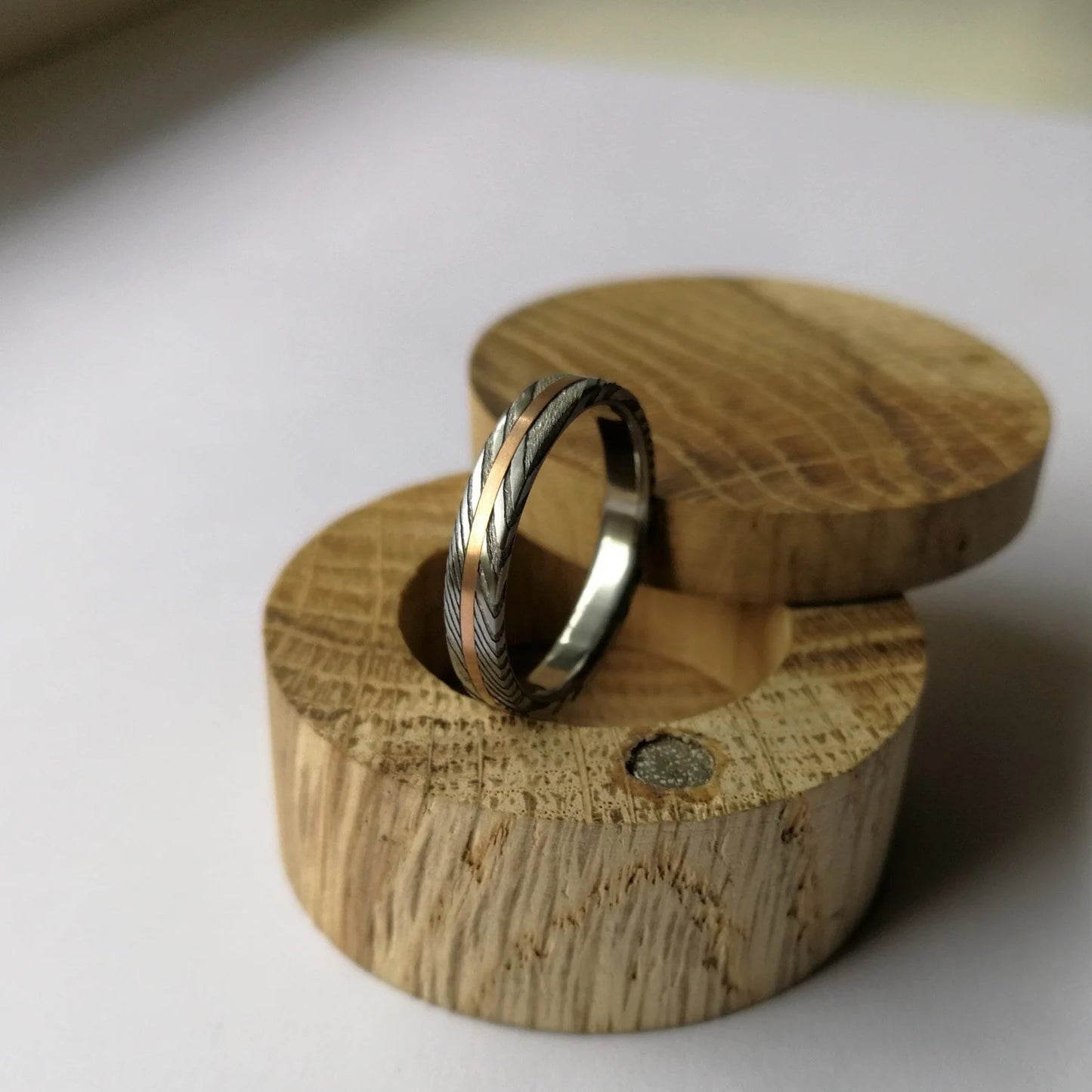 Unique Titanium and Stainless Damascus Steel Ring with Solid Gold Channel.