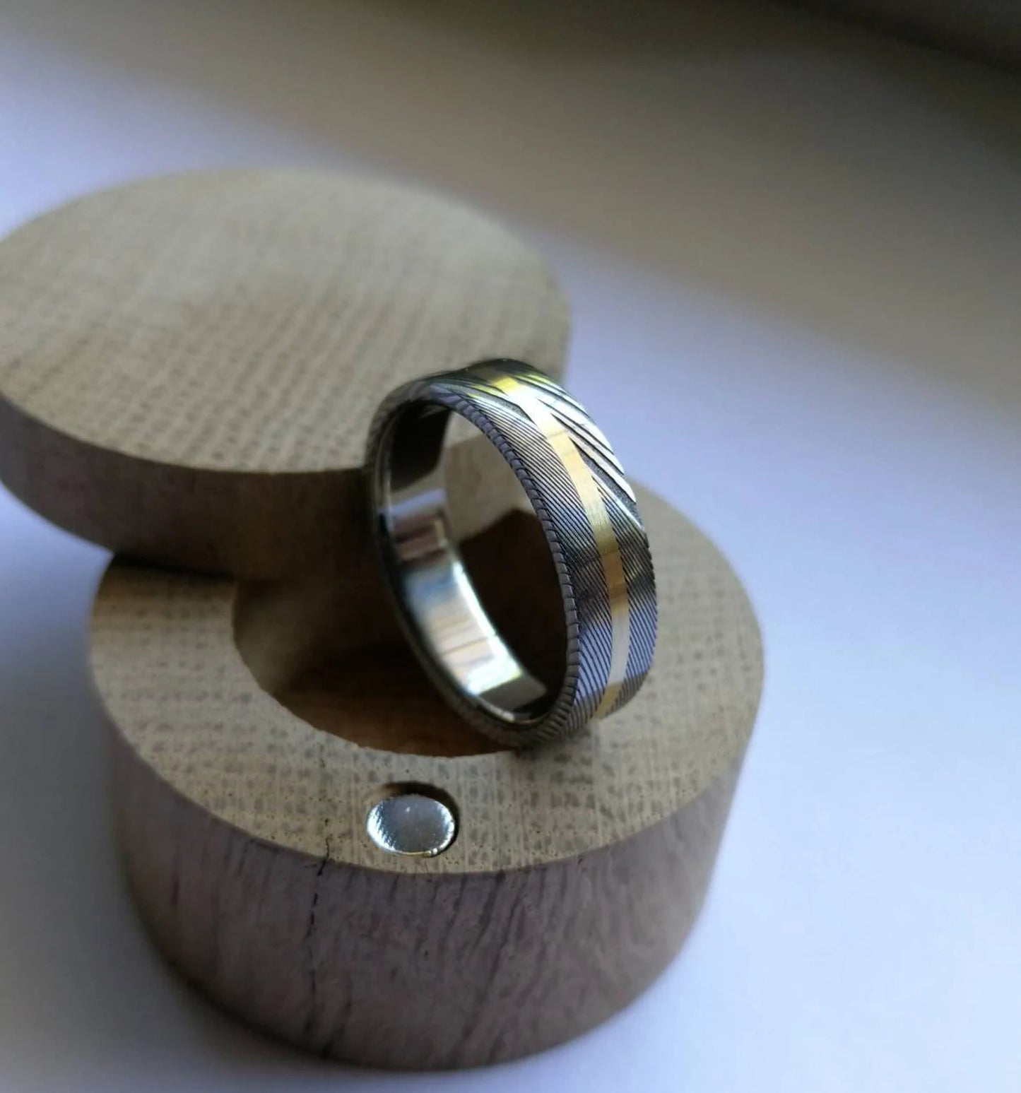 Unique Titanium and Stainless Damascus Steel Ring with Solid Gold Channel.