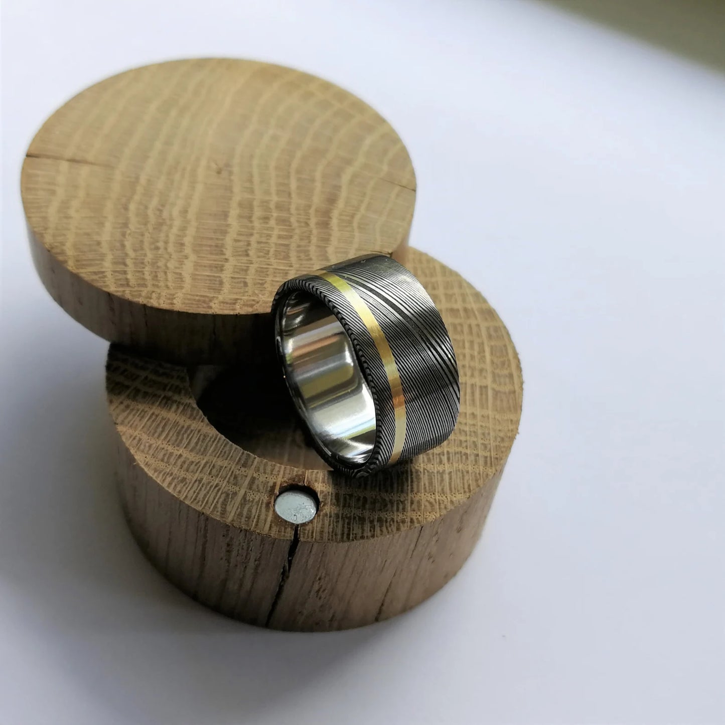 Unique Titanium and Stainless Damascus Steel Ring with Solid Gold Channel.