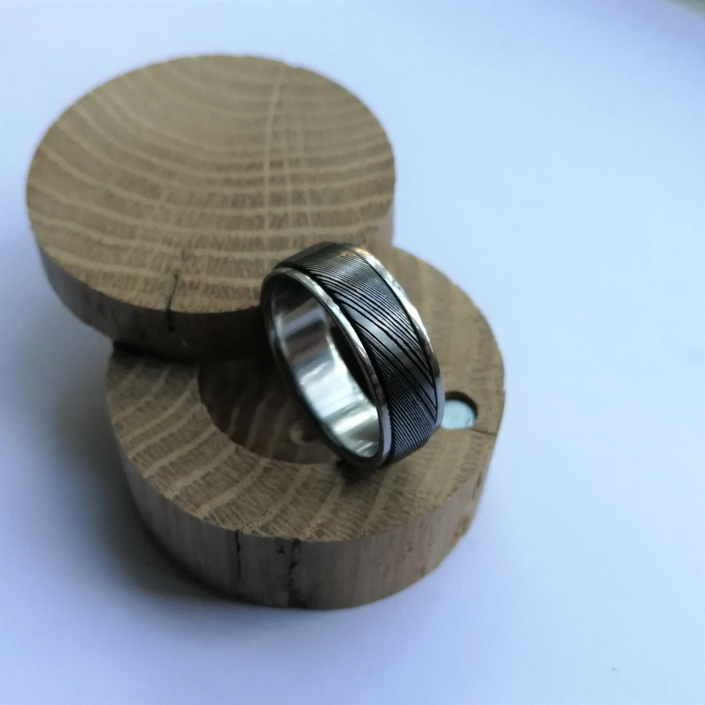 Unique Handmade Stainless Damascus Steel and Titanium Spinner Ring.