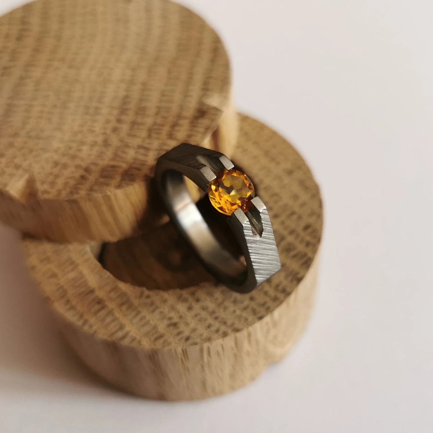 Unique Handmade Brushed Titanium Tension Ring with Round Diamond Cut Stone Setting.