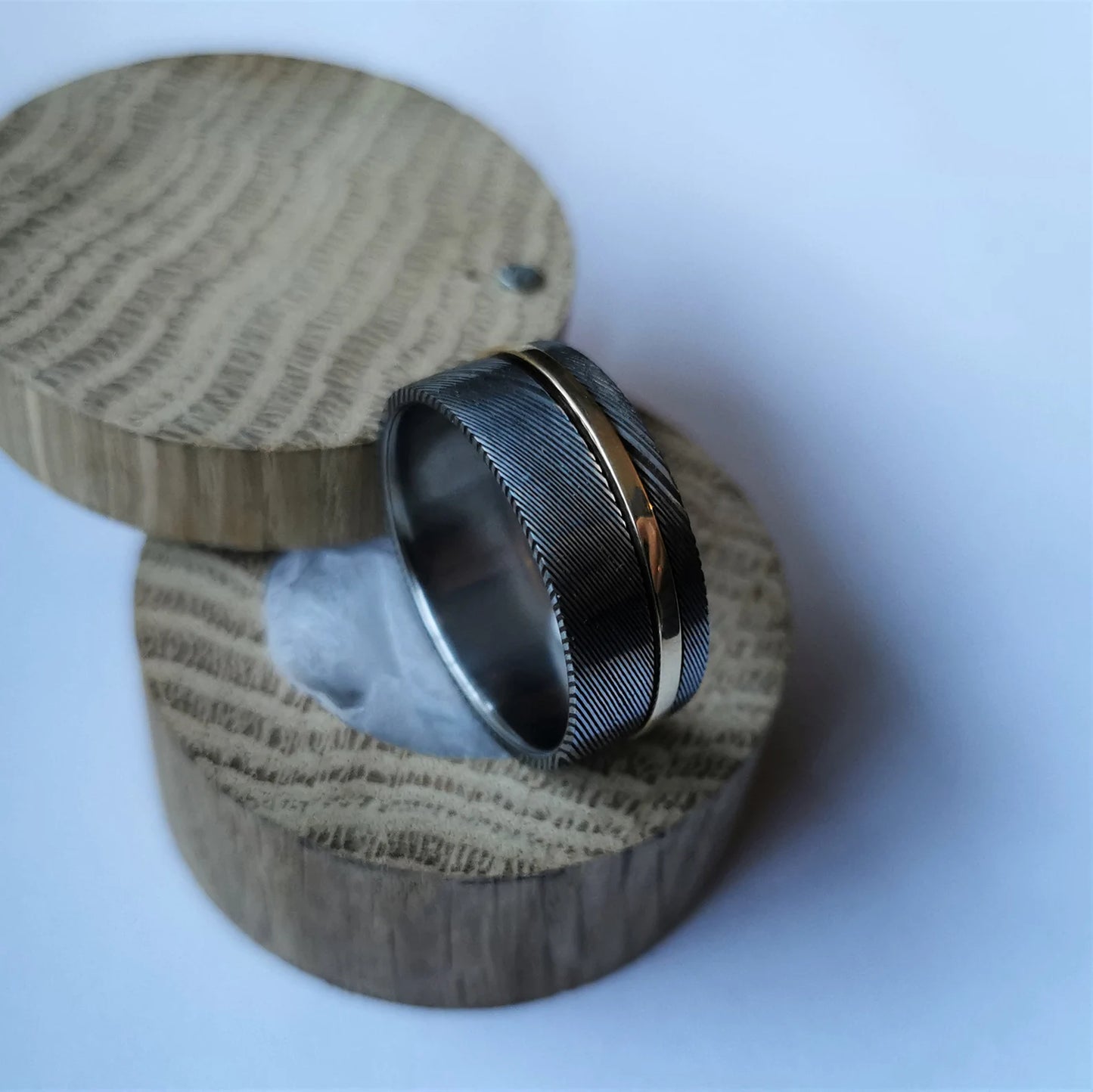 Unique Handmade Stainless Damascus Steel, Solid Gold and Titanium Spinner Ring.