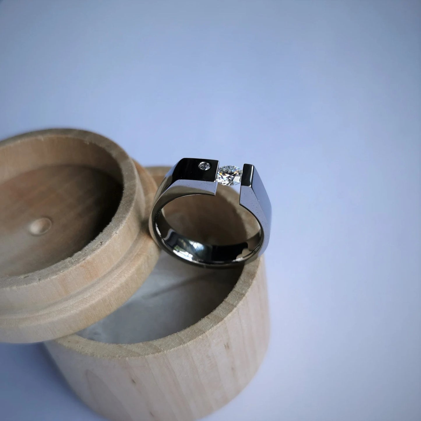 Unique Handmade Polished Titanium Tension Ring with Moissanite Round Diamond Cut Stone Setting.