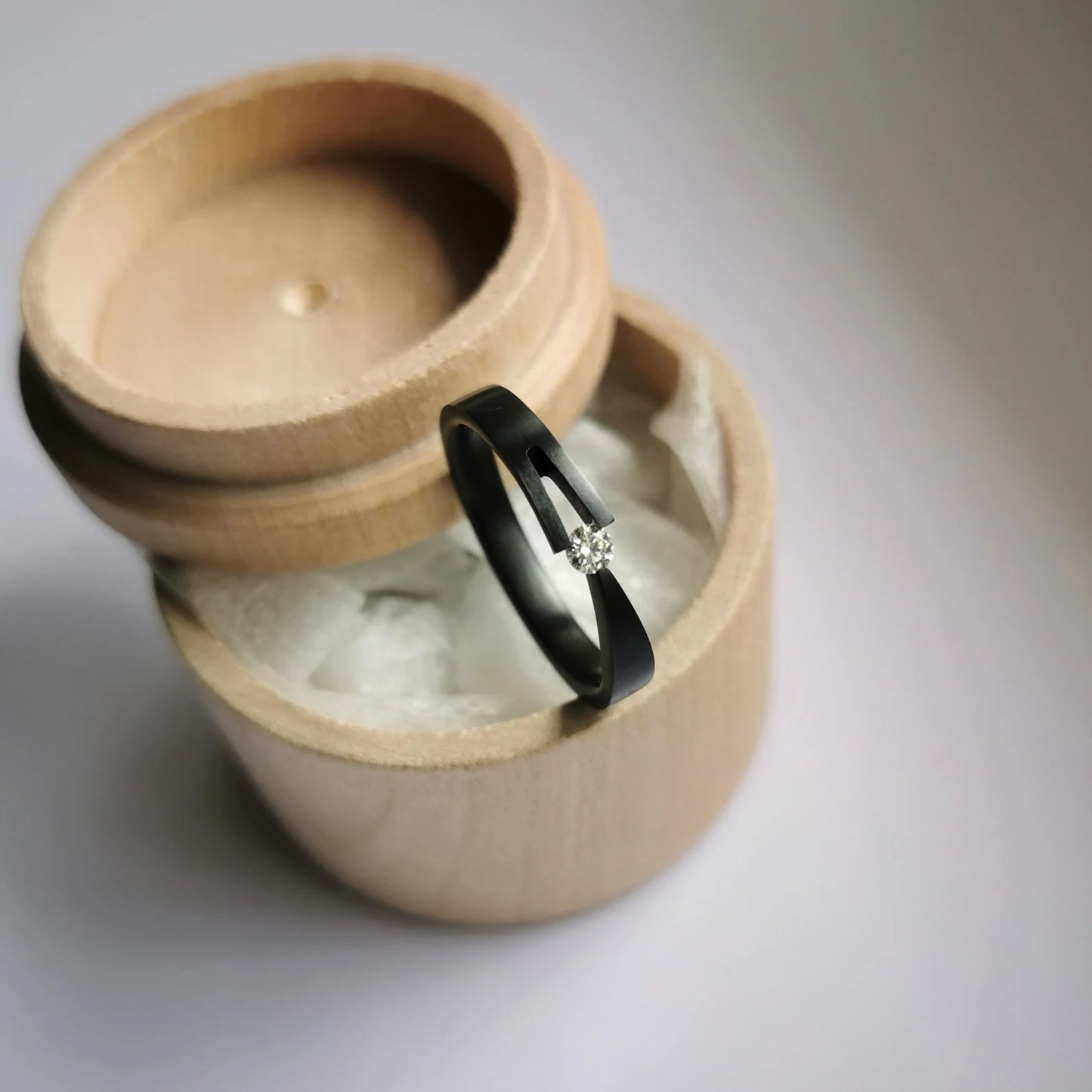 Unique Handmade Brushed Zirconium Tension Ring with Round Brilliant Cut Stone Setting.