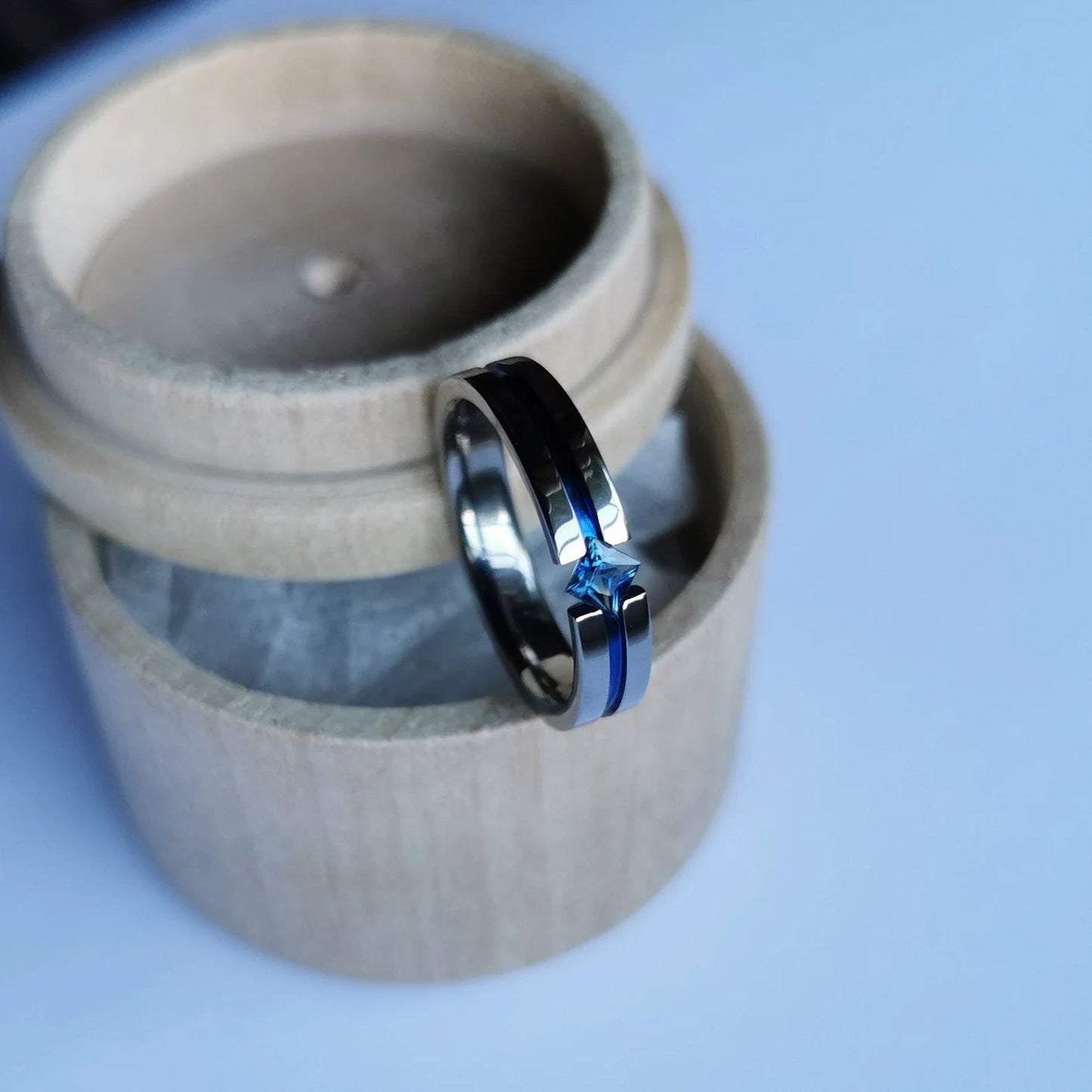 Unique Handmade Polished Titanium Tension Ring with Princess Cut Stone Setting and Anodized Channel.