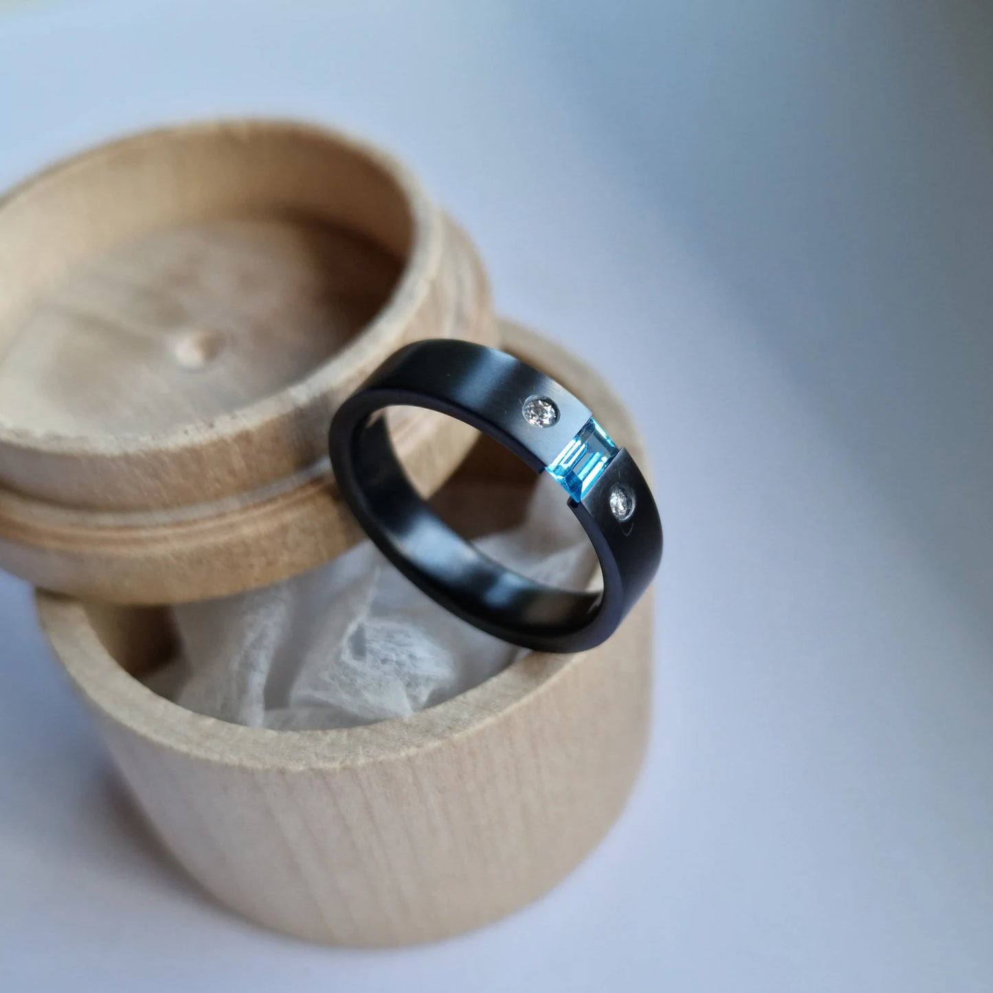 Unique Handmade Black Zirconium Tension Band with Baguette Cut Stone Setting and Flush Set 2 mm Accent Moissanites.