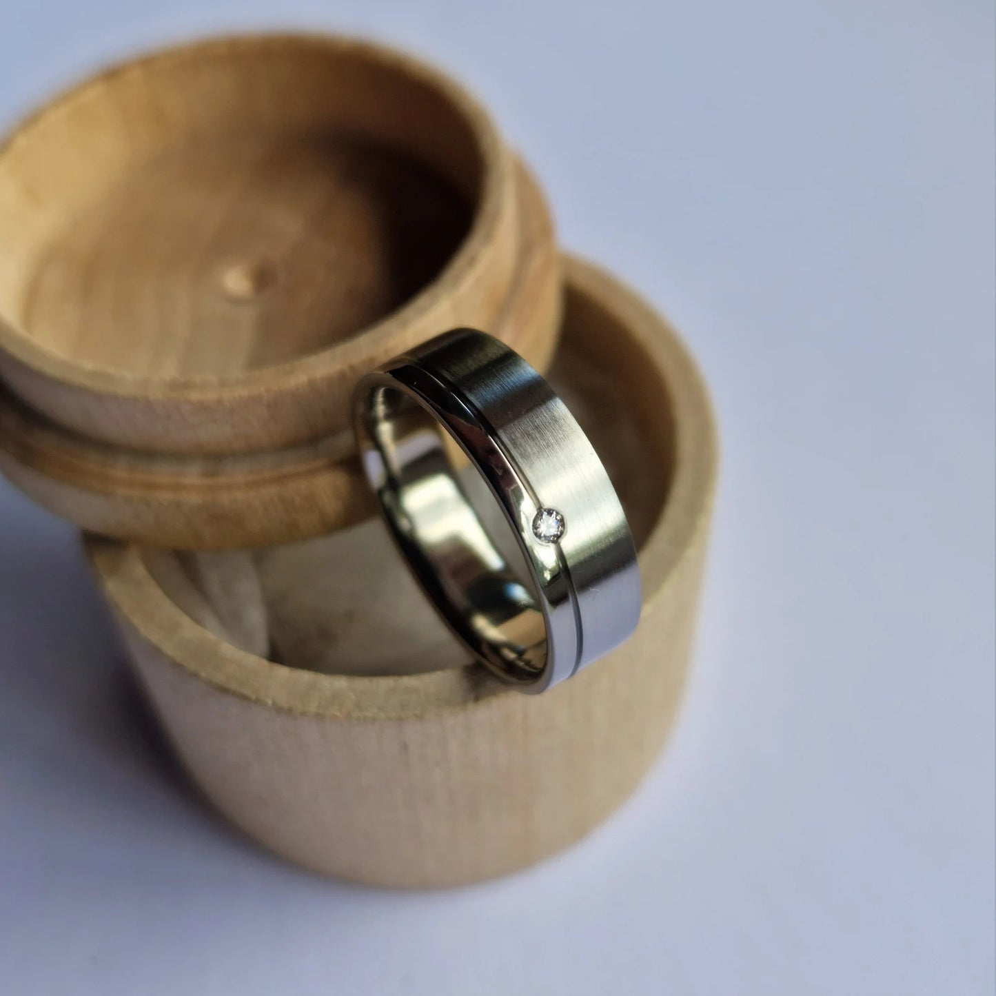 Flush Set Two Tone (brushed and polished) Titanium Band.