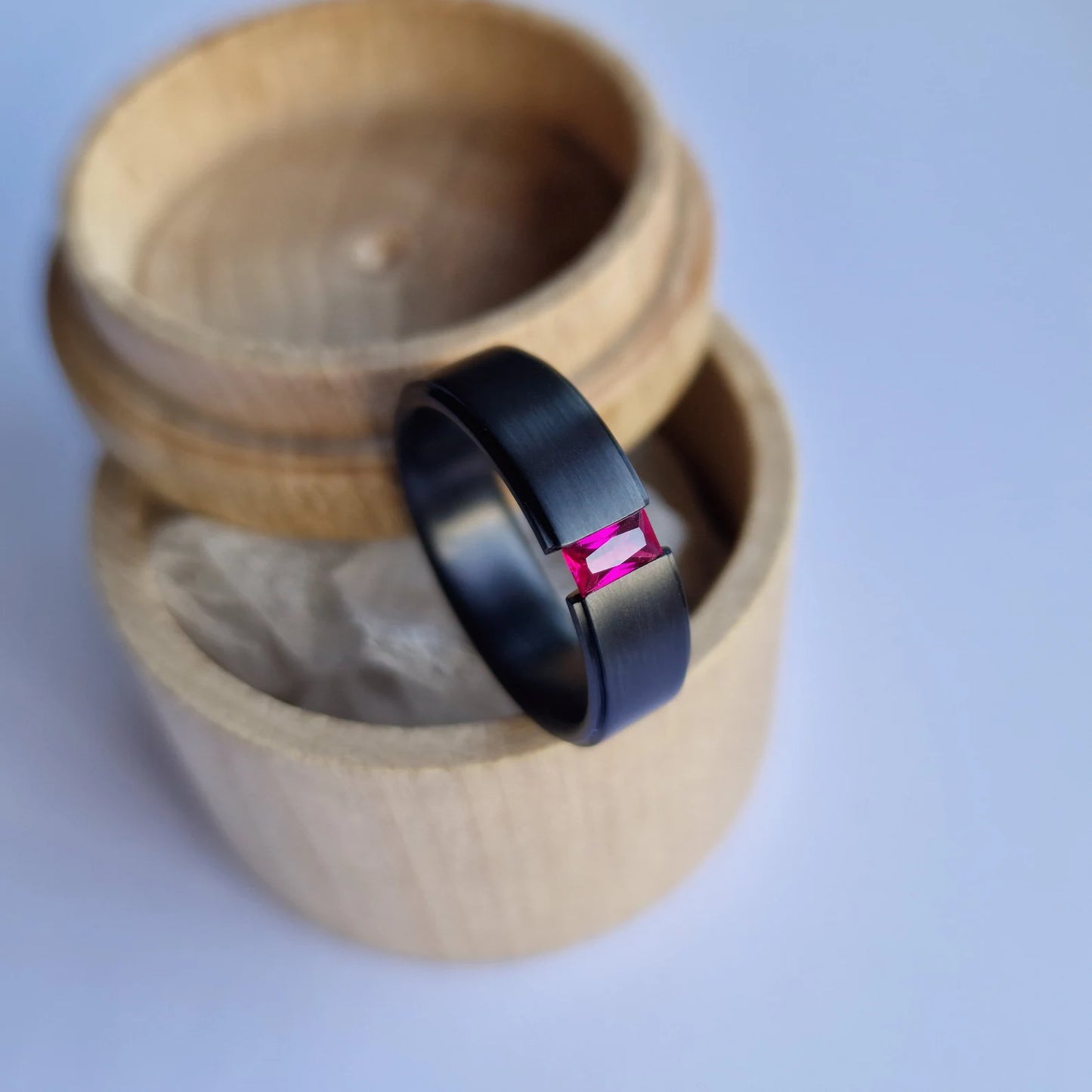 Unique Handmade Black Zirconium Tension Band with Baguette Cut Stone Setting.