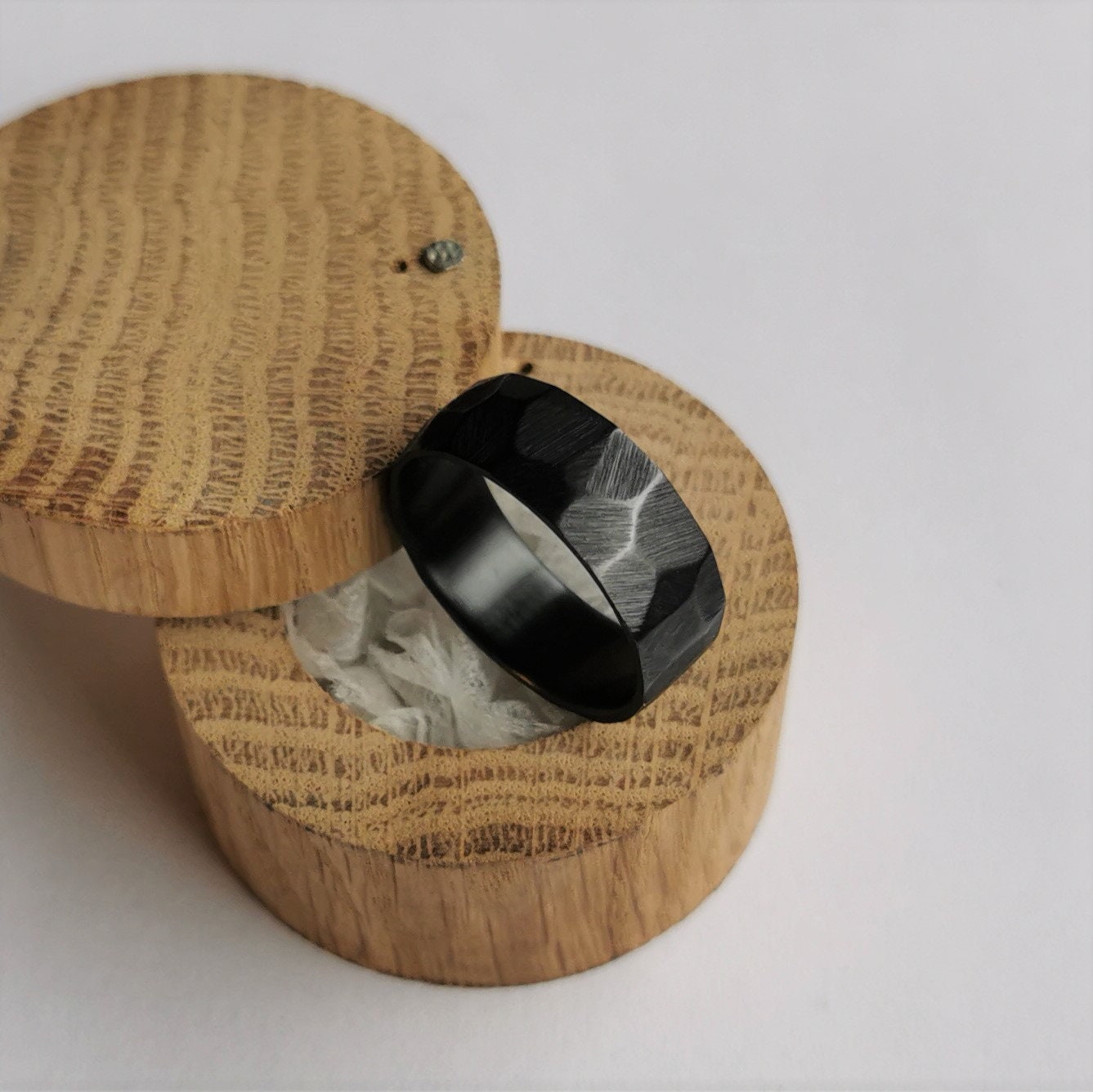 Handmade Rough Finish Faceted Black Zirconium Band.