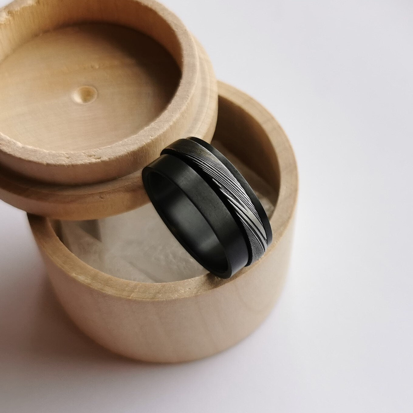 Unique Handmade Black Zirconium and Stainless Damascus Steel Spinner Ring.