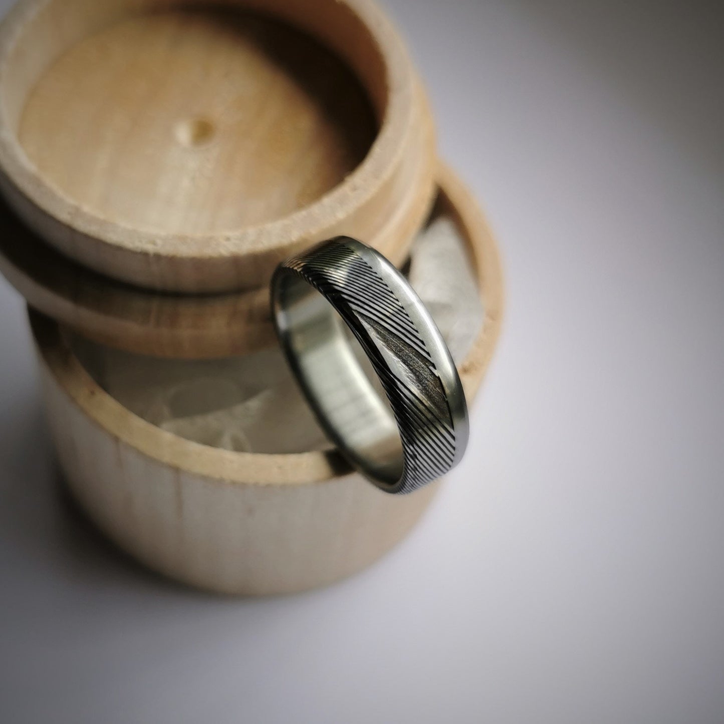 Unique Handmade Beveled Stainless Damascus Steel and Titanium Ring.