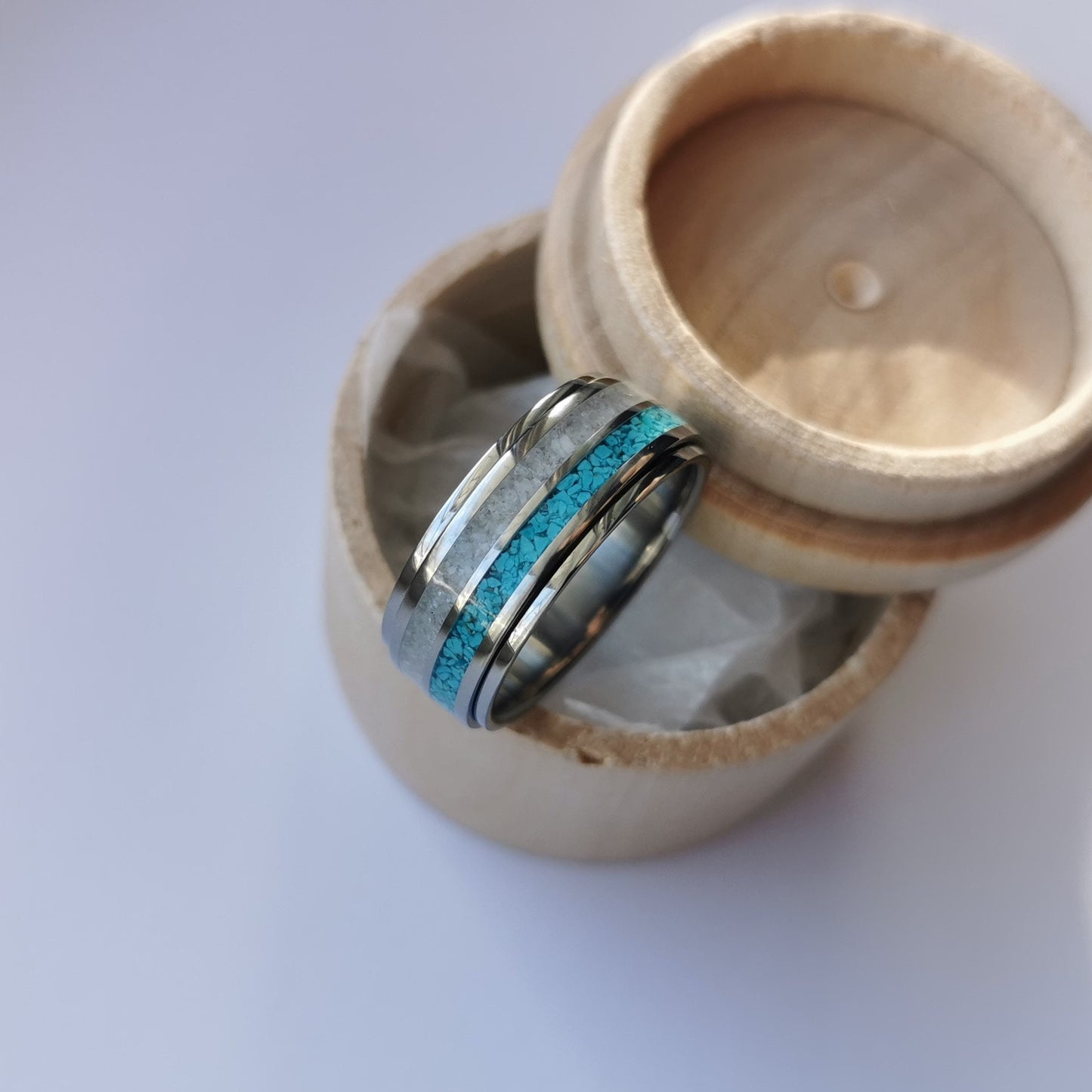 Unique Handmade Titanium Spinner Ring With Turquoise and Moonstone Channels.