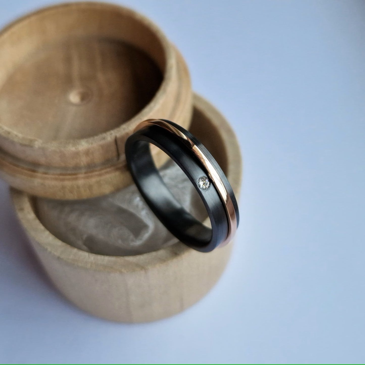 Black Zirconium and Solid Gold Spinner Ring-Band with Flush Set Stone.