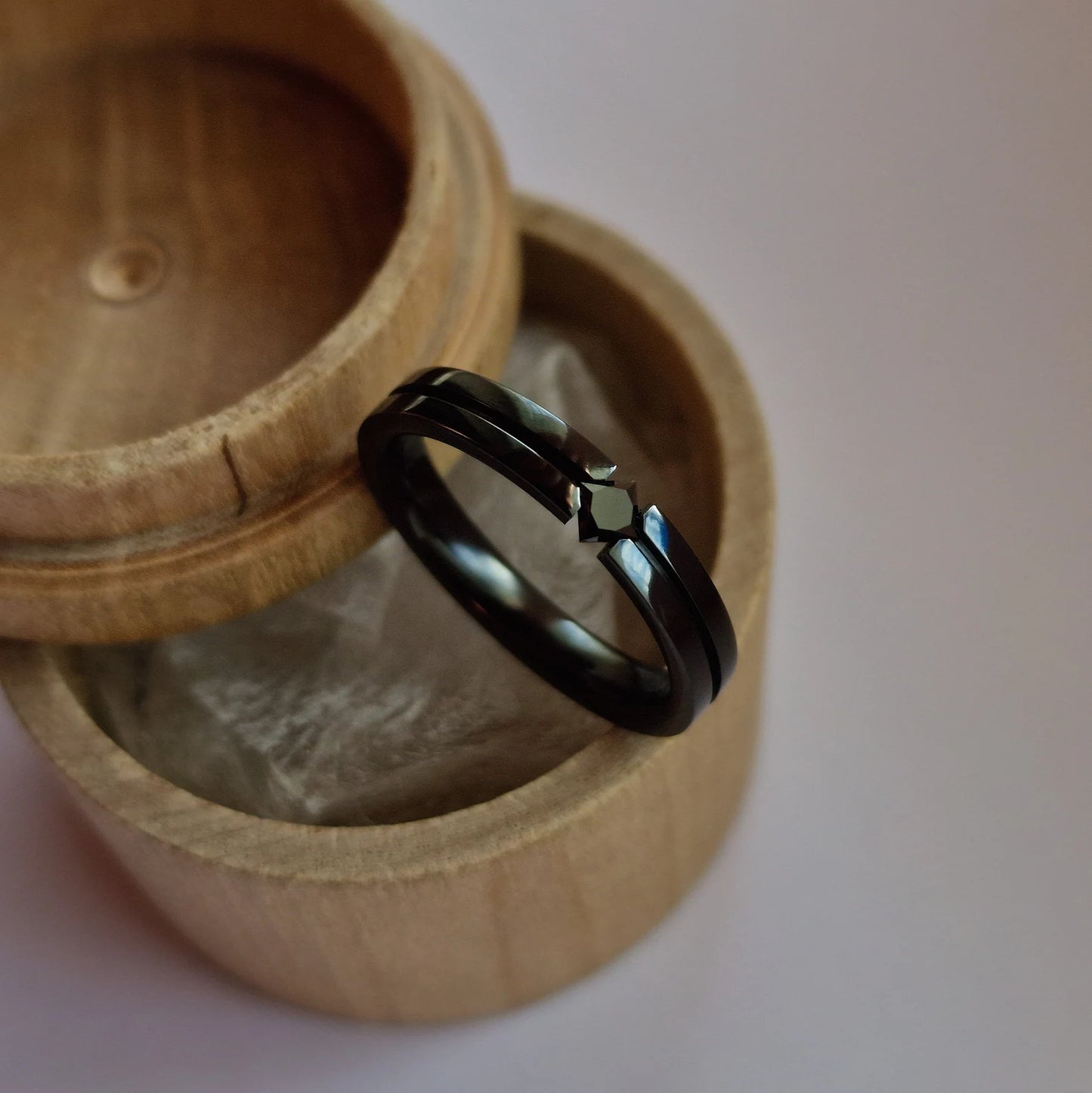 Handmade Polished Black Zirconium Tension Ring with Princess Cut