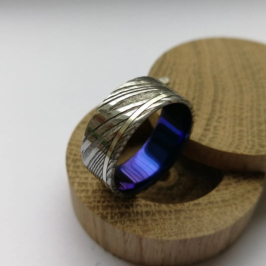 Custom Anodized Titanium and Stainless Damascus Steel Ring with Sterling Silver / Solid Gold Channel.