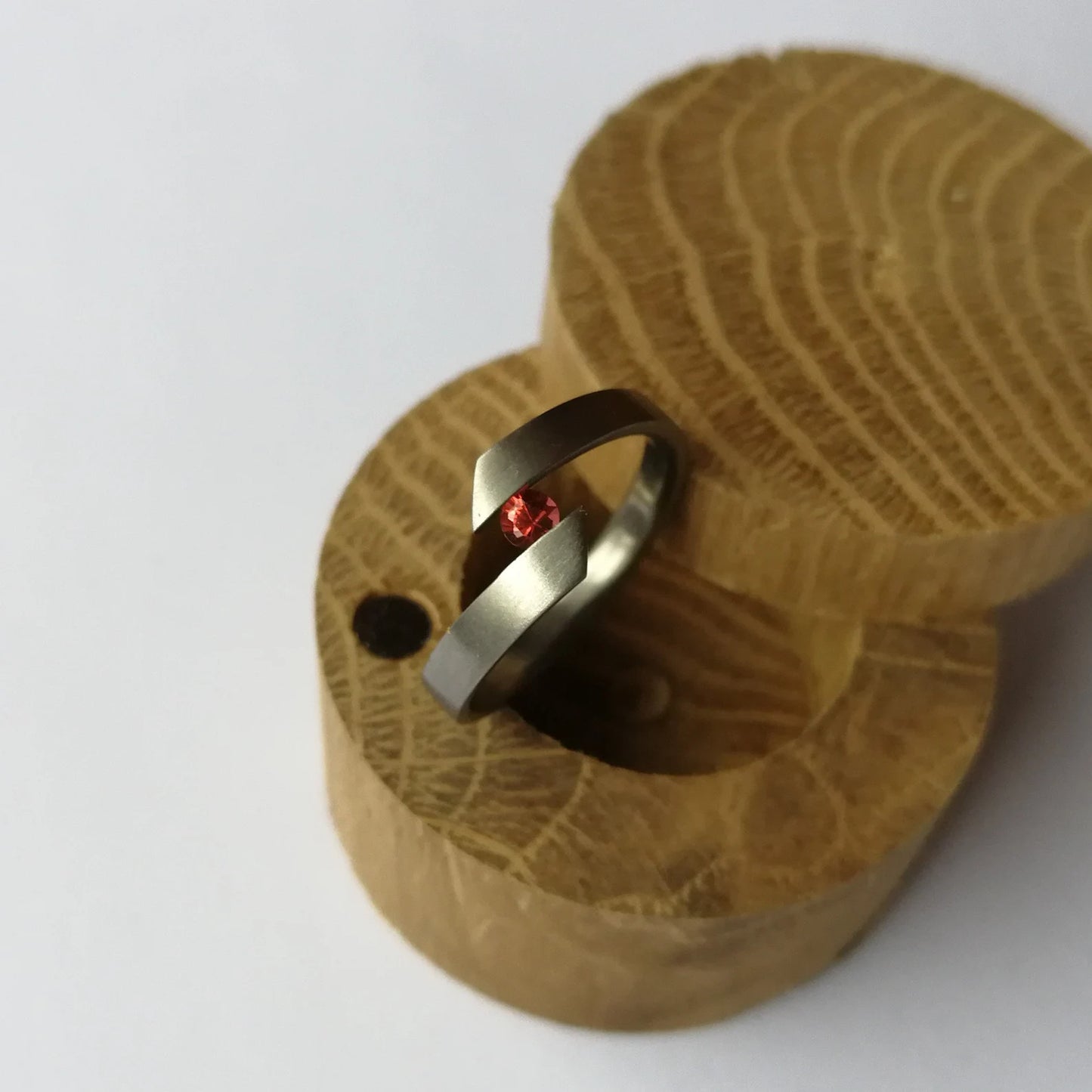 Unique Handmade Brushed Titanium Tension Ring with Brilliant Round Cut Gemstone Setting.