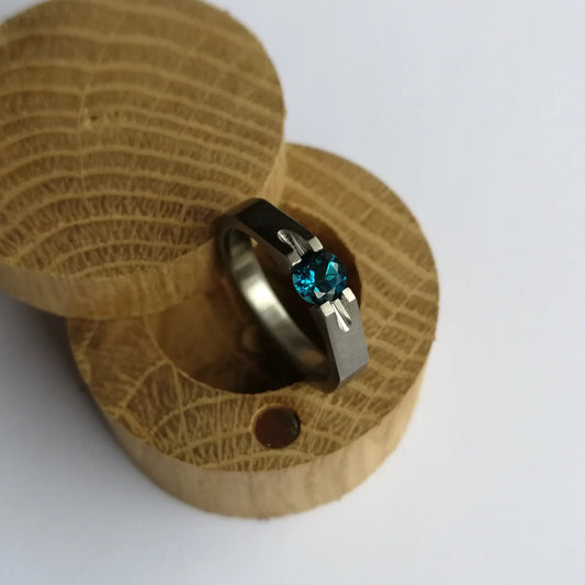 Unique Handmade Brushed Titanium Tension Ring with Round Diamond Cut Stone Setting.