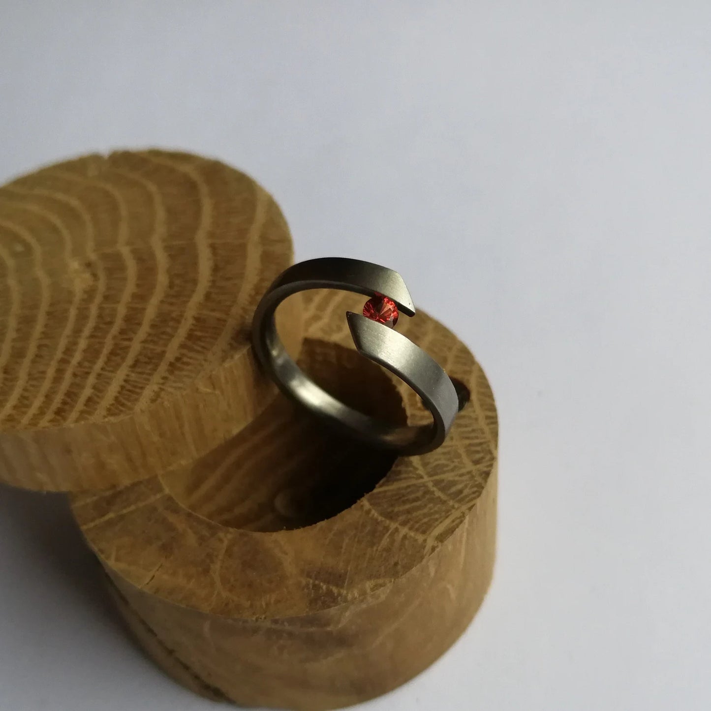 Unique Handmade Brushed Titanium Tension Ring with Brilliant Round Cut Gemstone Setting.