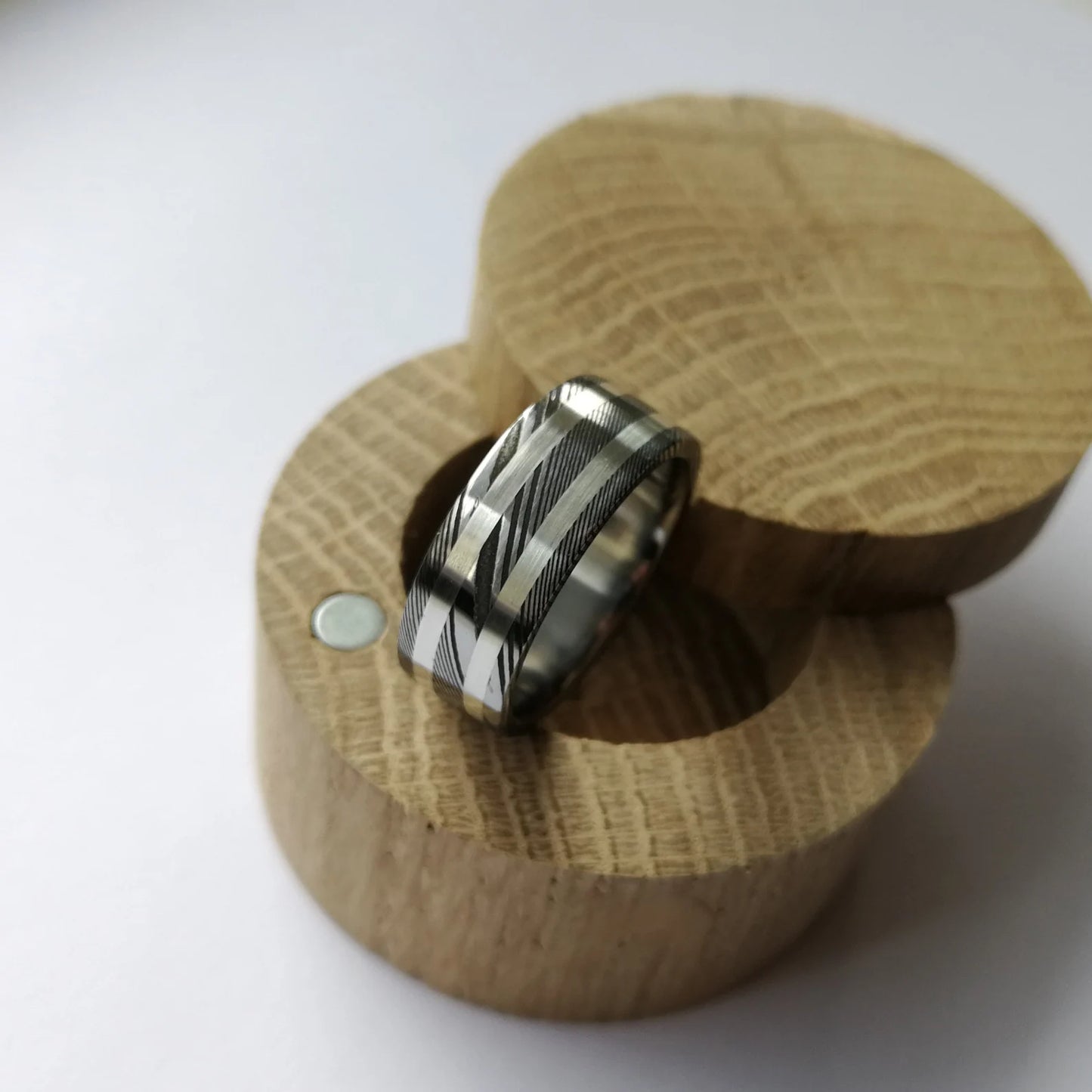 Unique Titanium and Stainless Damascus Steel Ring with Two Solid Gold Channels.