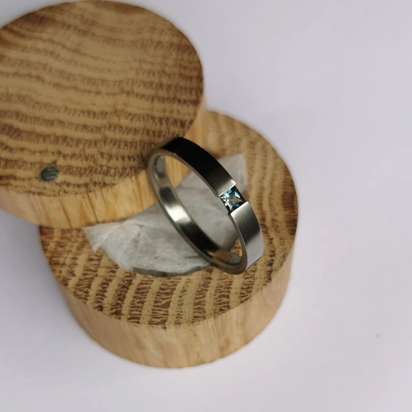 Unique Handmade Brushed Titanium Tension Ring with Princess Cut Stone Setting.