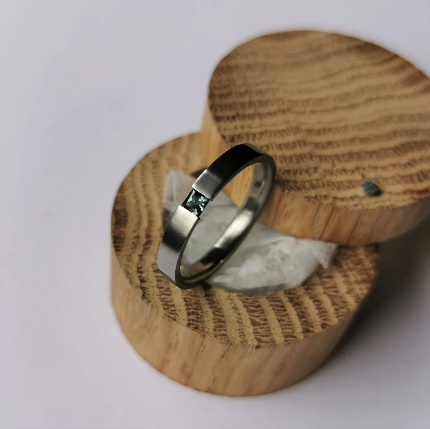 Unique Handmade Brushed Titanium Tension Ring with Princess Cut Stone Setting.