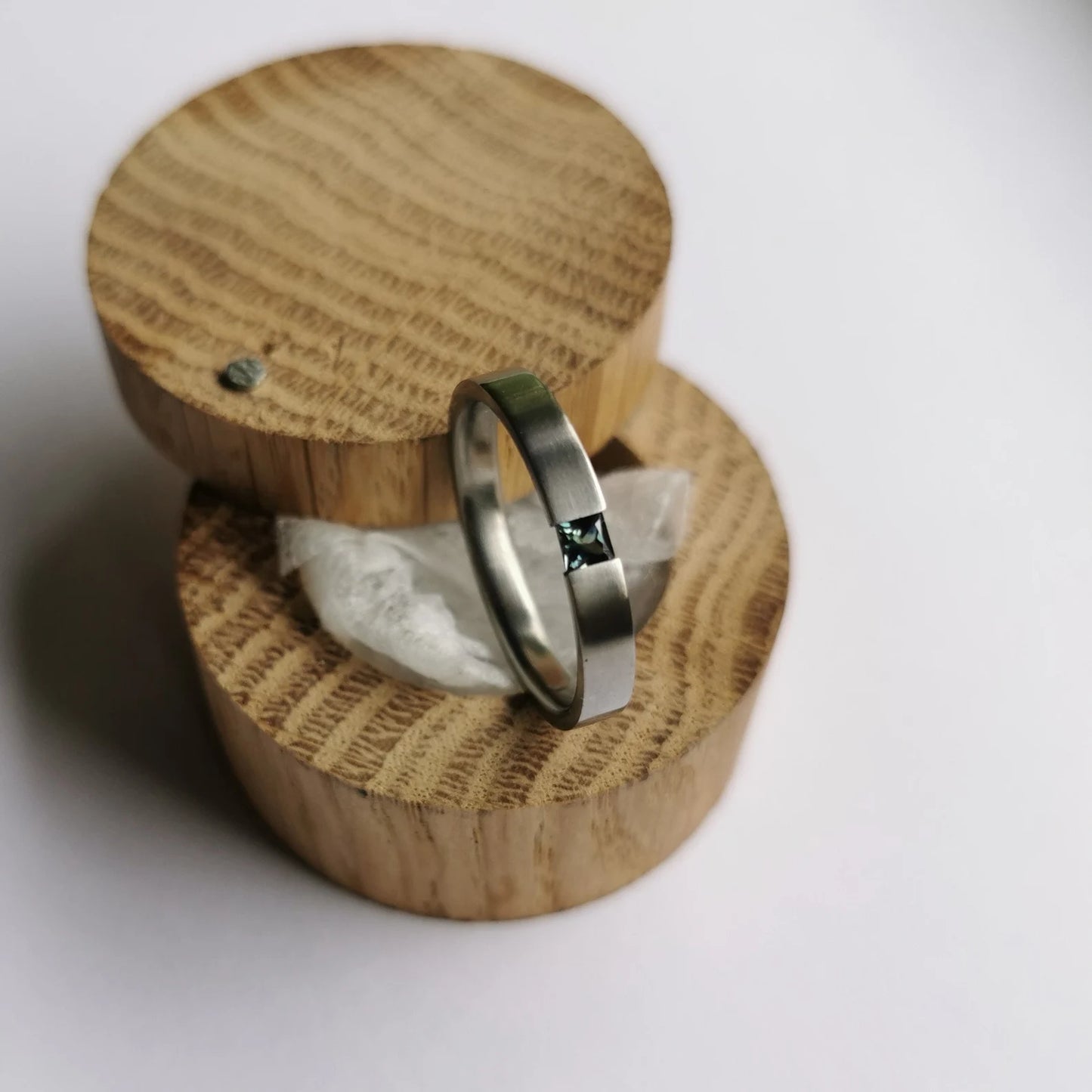 Unique Handmade Brushed Titanium Tension Ring with Princess Cut Stone Setting.