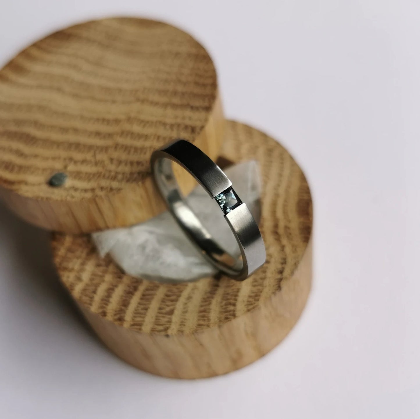 Unique Handmade Brushed Titanium Tension Ring with Princess Cut Stone Setting.