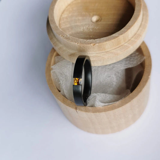 Handmade Brushed Black Zirconium Tension Ring with Princess Cut Stone Setting.
