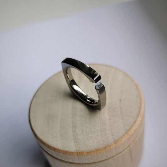 Unique Handmade Brushed Titanium Tension Ring with Square Diamond Cut Stone Setting.