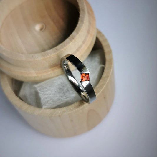 Unique Handmade Polished Titanium Tension Ring with Princess Cut Stone Setting.