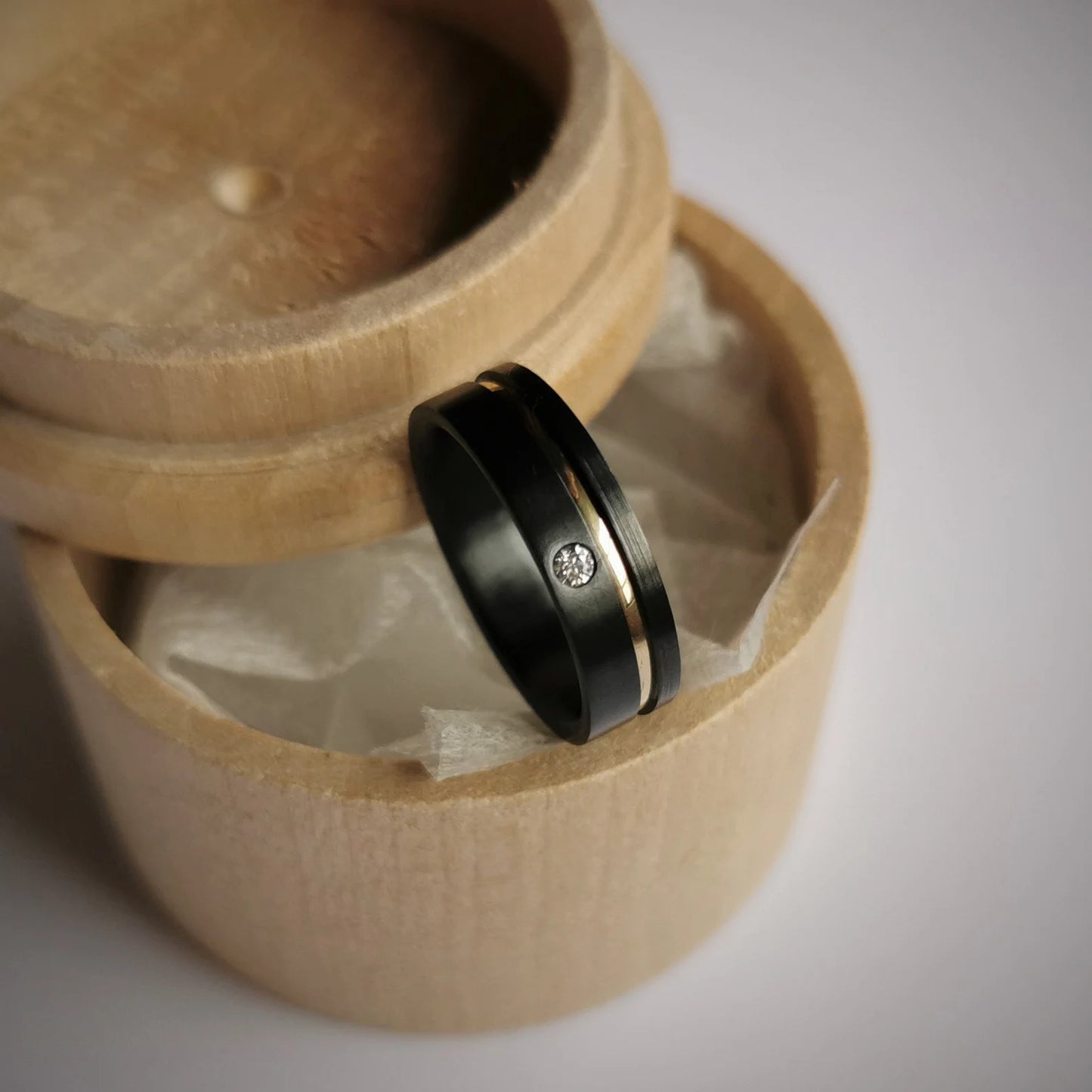 Black Zirconium and Solid 14K Gold Band with Flush Set Stone. Two Tone Finish.