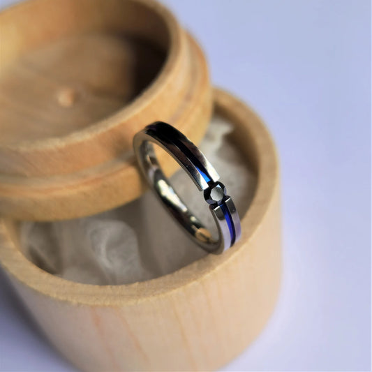 Unique Handmade Polished Titanium Tension Ring with Round Brilliant Cut Stone Setting and Anodized Channel.