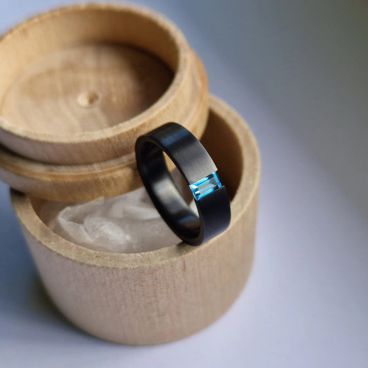 Unique Handmade Black Zirconium Tension Band with Baguette Cut Stone Setting.