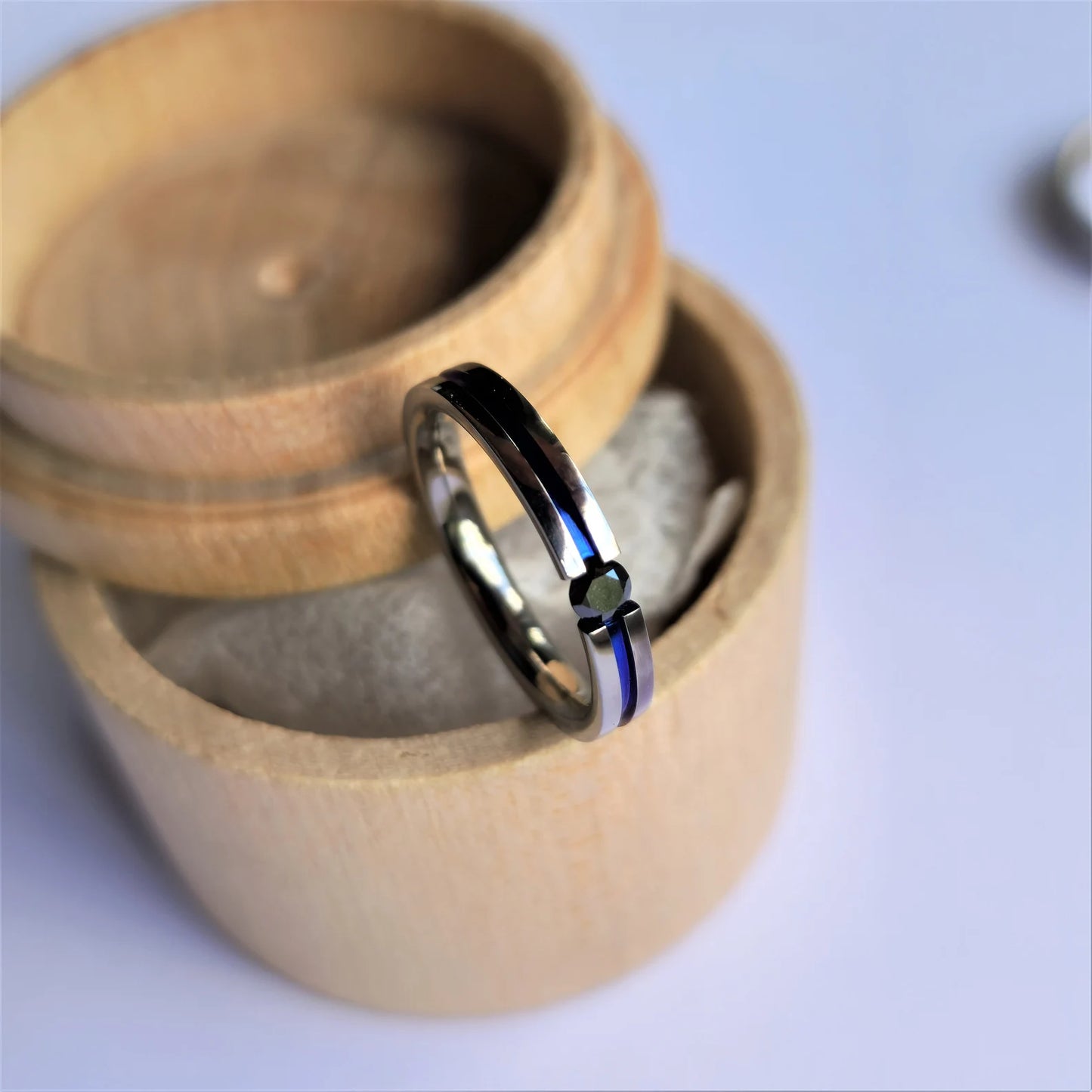 Unique Handmade Polished Titanium Tension Ring with Round Brilliant Cut Stone Setting and Anodized Channel.