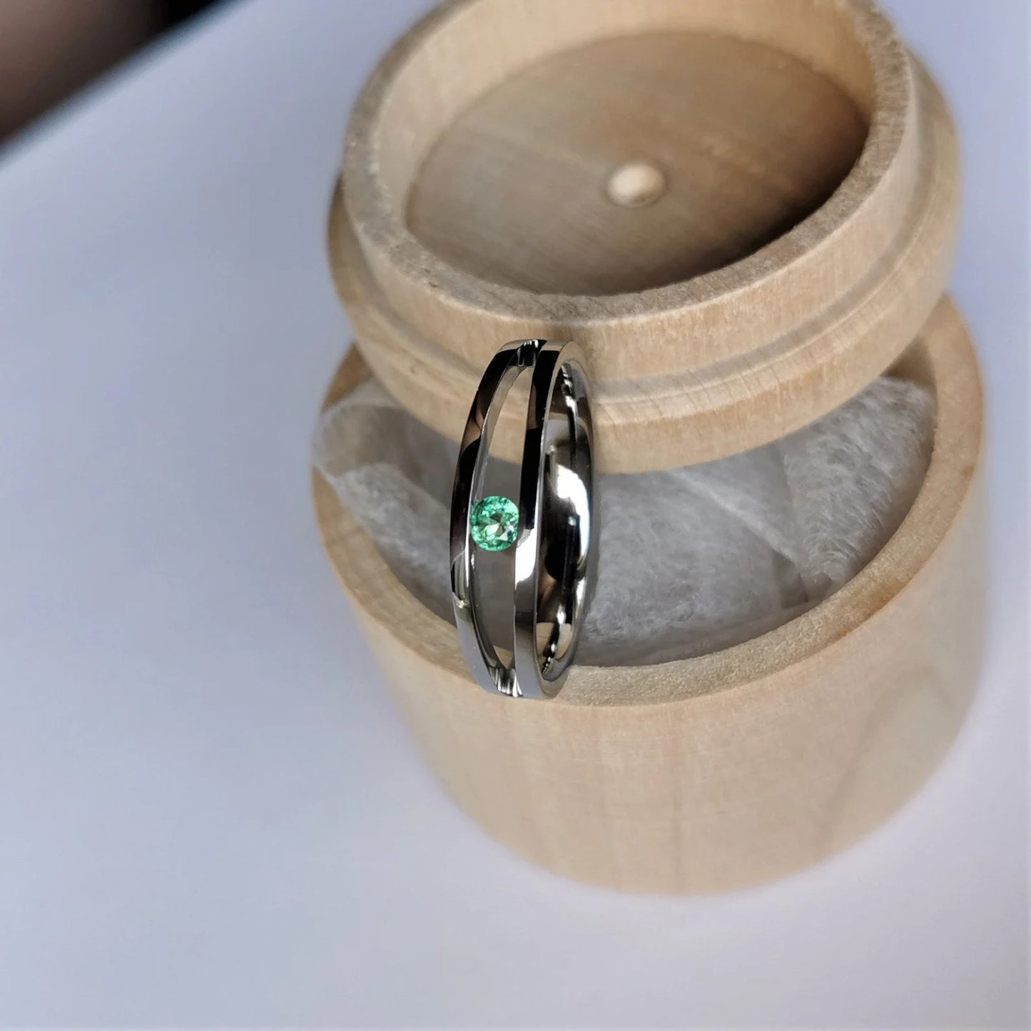 Unique Handmade Polished Titanium Tension Ring with Diamond Cut Stone Setting.